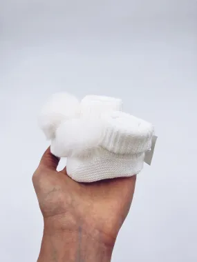 Ivory knitted Pompom booties.