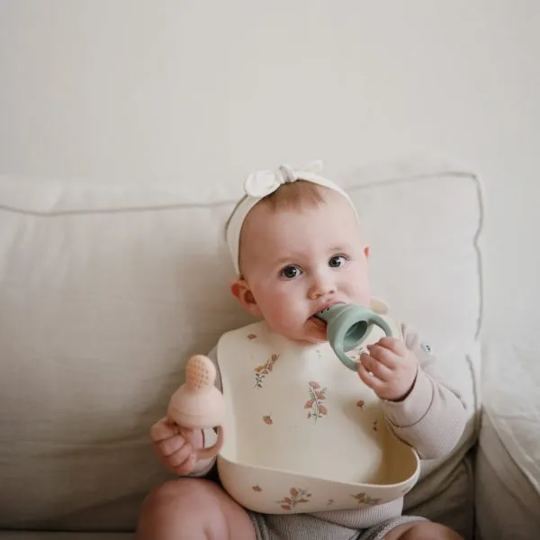 Silicone Bib by Mushie - Pink Flowers